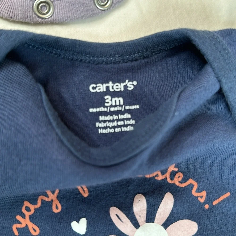 Carter’s bundle of 6 short sleeve baby girl onesies. They all have cute sayings.